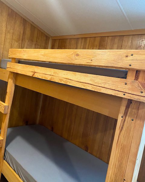 Ranger Smith cabin interior bunk beds